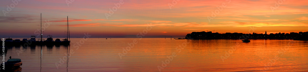 Sunset in small coastal town Stobrec near Split, Croatia.
