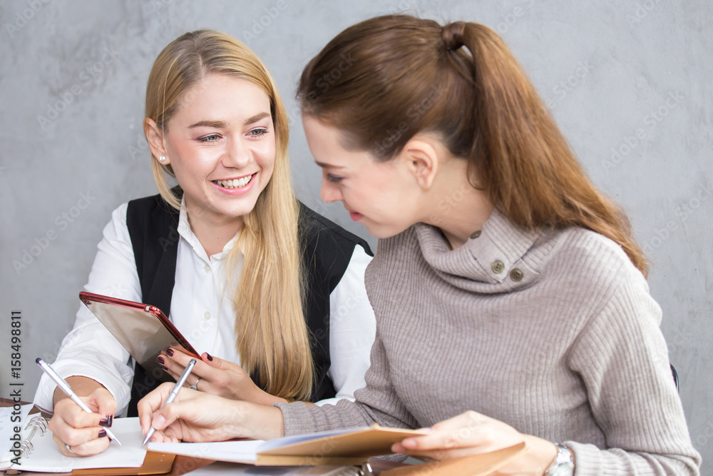 Young Asian woman arriving for a job interview. Business people takling in modern office. Greeting deal concept Young Asian woman arriving for a job interview. Business people takling in modern office. Greeting deal concept