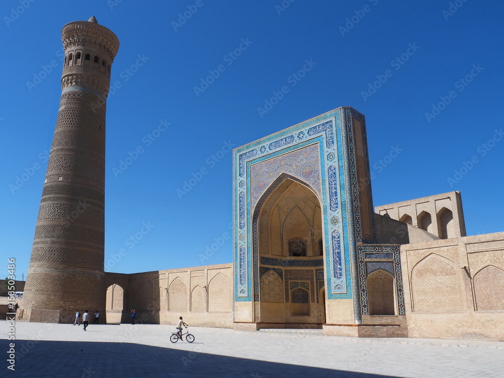 Minaret and entrance to Kalyan Mosque in Bukhara, Uzbekistan
