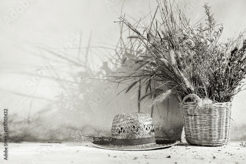 still life country with lantern and wicker basket. boho style decor