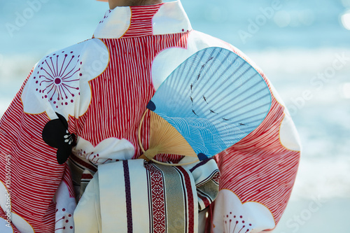 海と浴衣女性 photo