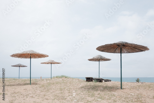 Sunshade umbrella on sea beach © Ivan Kmit