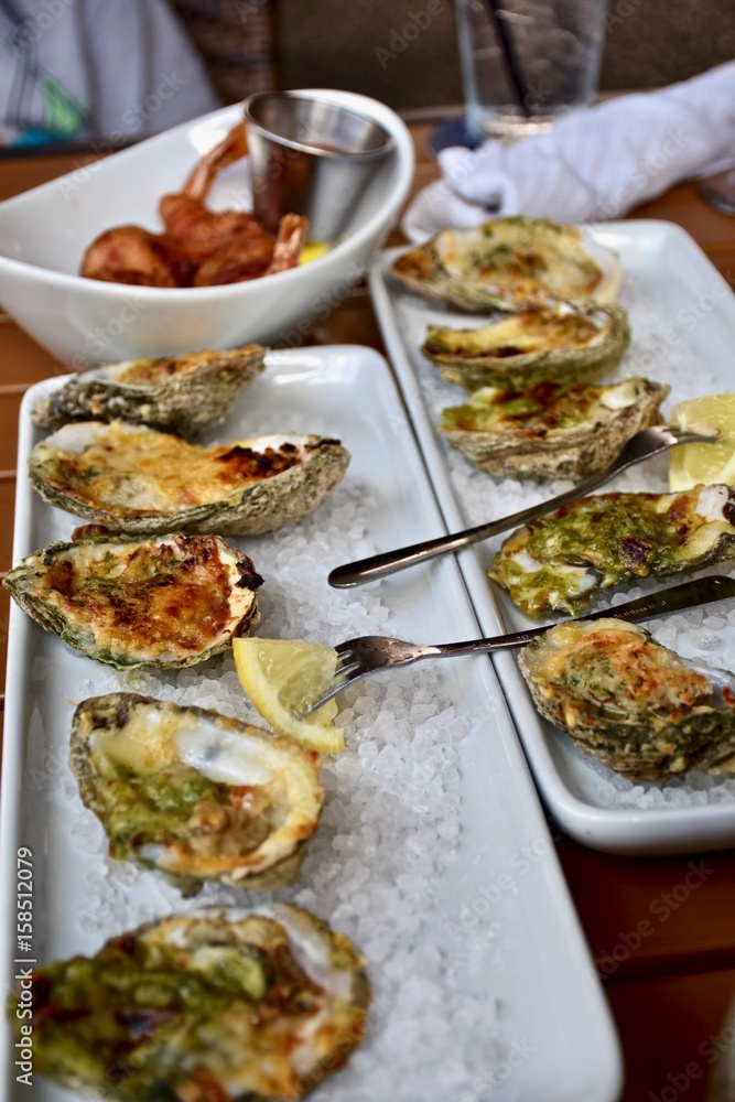 Oysters Rockefeller on a half shell Oysters Rockefeller on a half shell