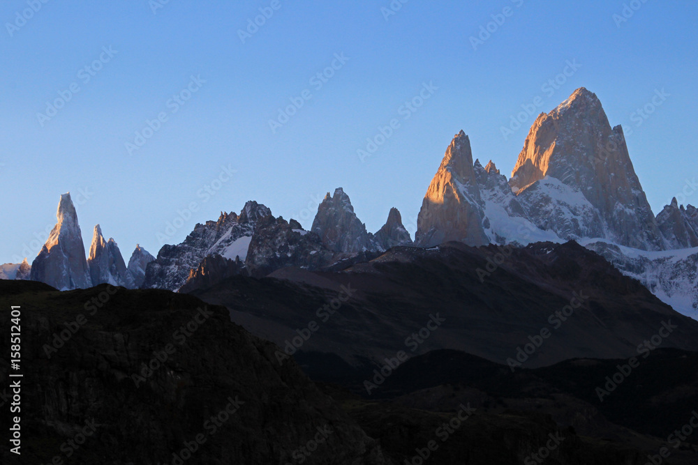 Obraz premium Fitz Roy and Cerro Torre mountainline at sunset, Los Glaciares National Park, El Challten, Patagonia, Argentina
