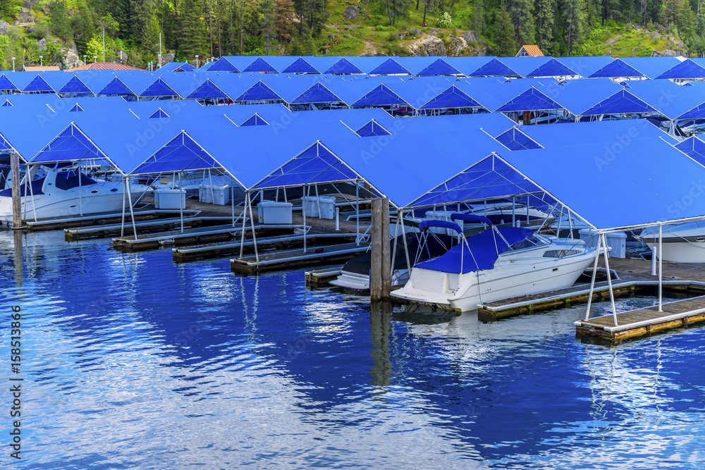 Blue Covers Boardwalk Marina Piers Boats Reflection Lake Coeur d' Alene Idaho Blue Covers Boardwalk Marina Piers Boats Reflection Lake Coeur d' Alene Idaho