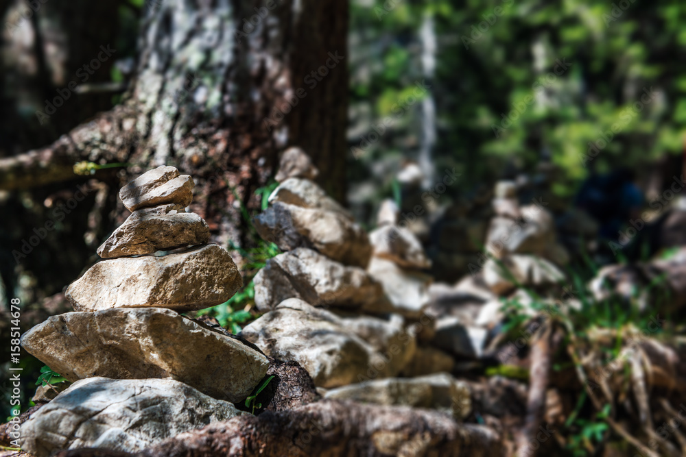 Rock cairns in countryside Rock cairns in countryside