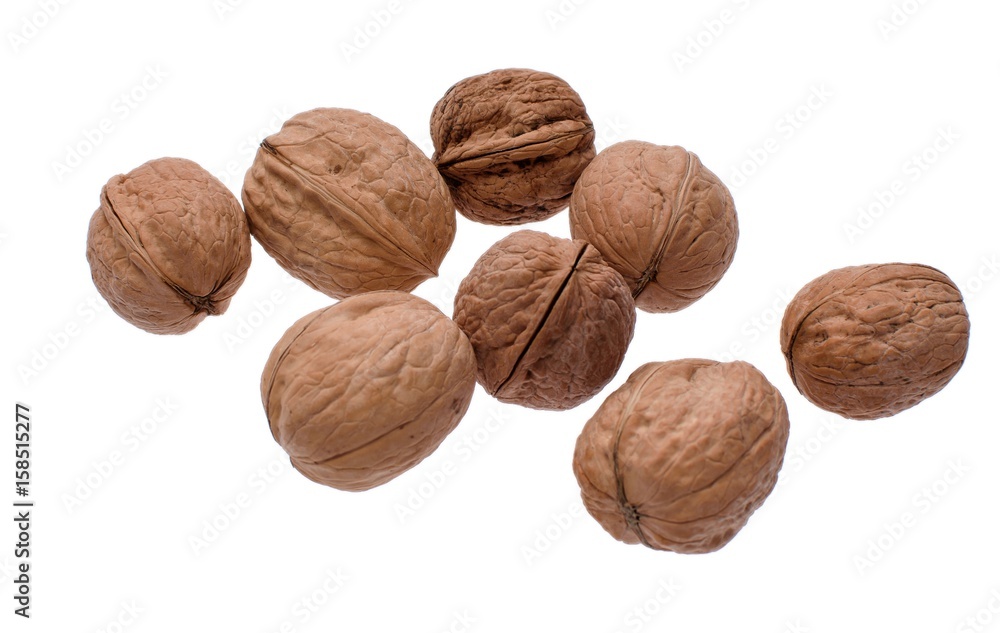 A lot of walnut isolated on white background A lot of walnut isolated on white background