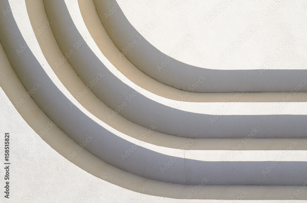 Abstract lines of arches in a white plastered wall. Abstract background ...