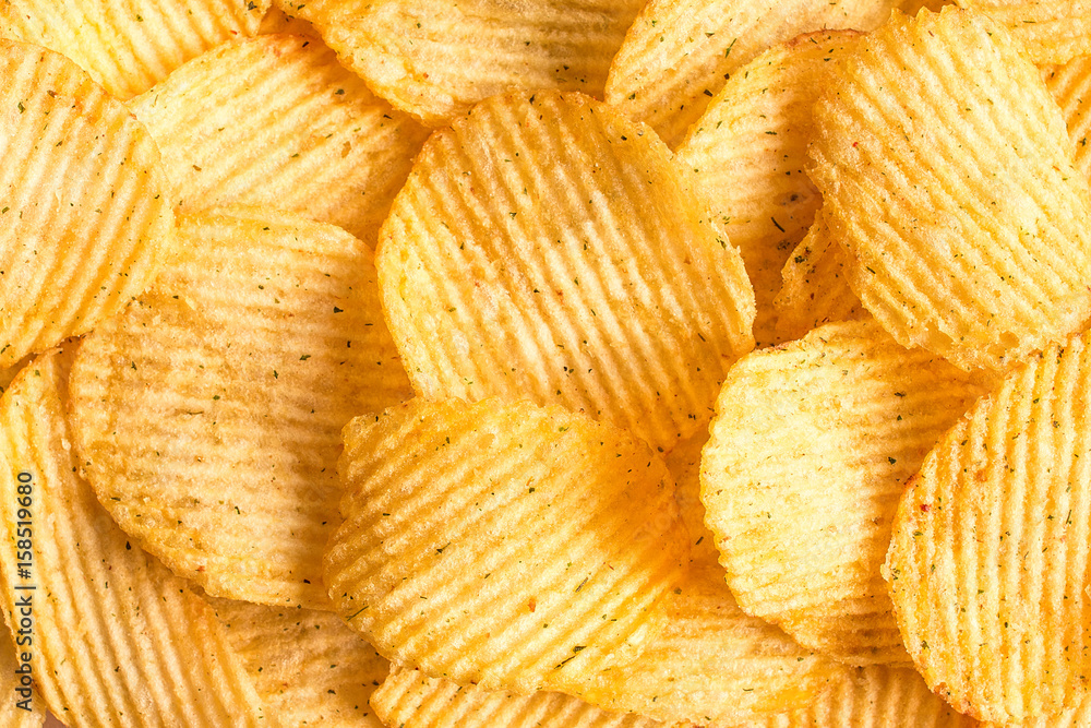 Potato chips texture background. Potatoes pattern. Potato chips texture background. Potatoes pattern.
