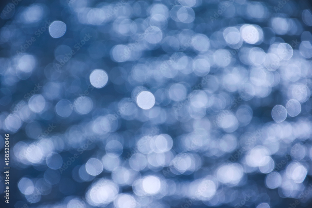 Obraz premium Water shining waves, bokeh background