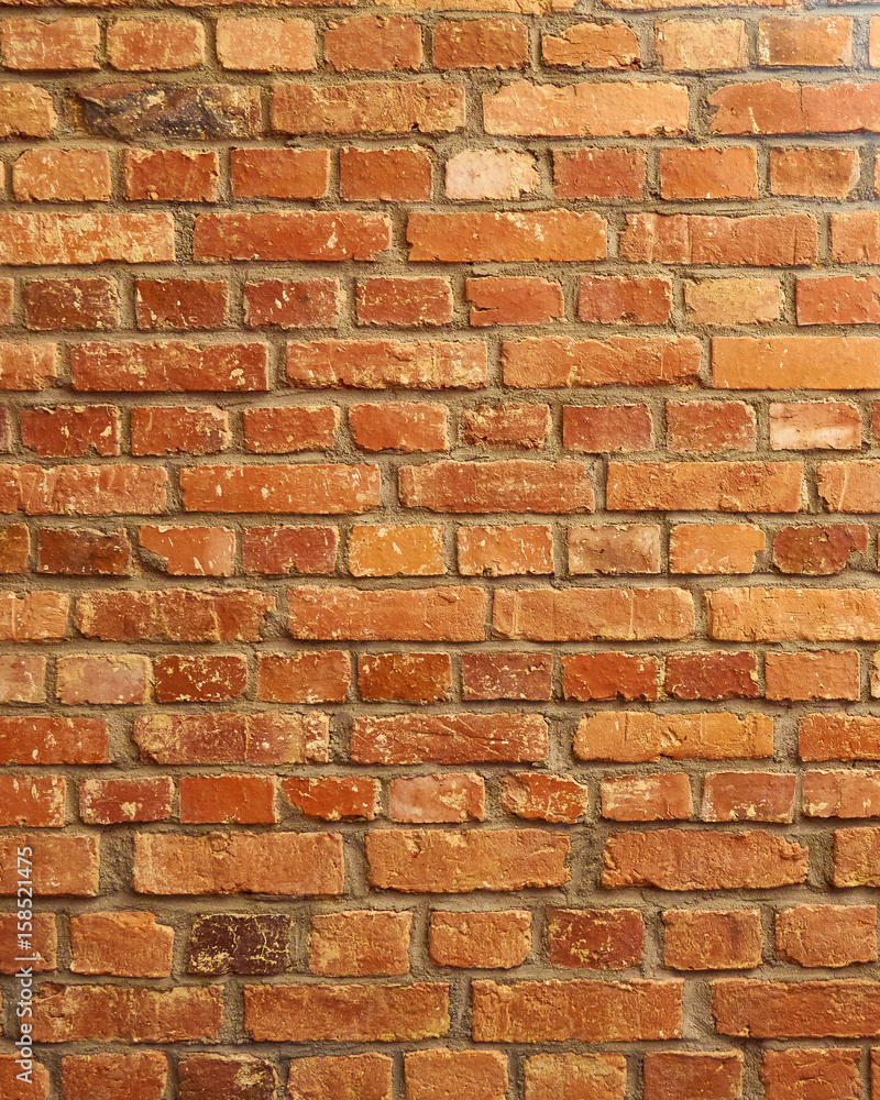 Old red brick wall closeup for vertical background Old red brick wall closeup for vertical background