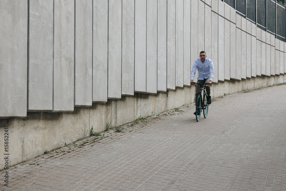 Man riding bicycle Man riding bicycle