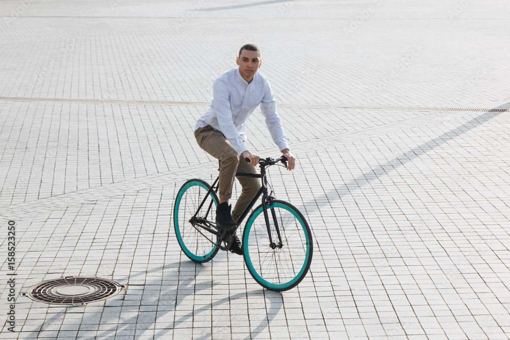 Fototapeta premium Man riding bicycle