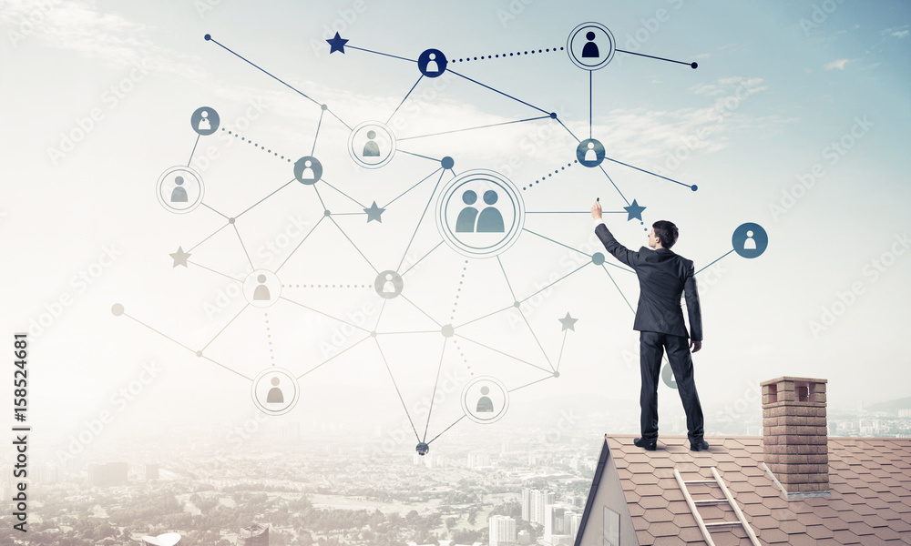 Businessman on house roof presenting networking and connection c Businessman on house roof presenting networking and connection c
