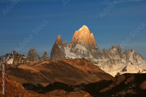 Fitz Roy and Cerro Torre mountainline at sunrise, Los Glaciares National Park, El Challten, Patagonia, Argentina photo