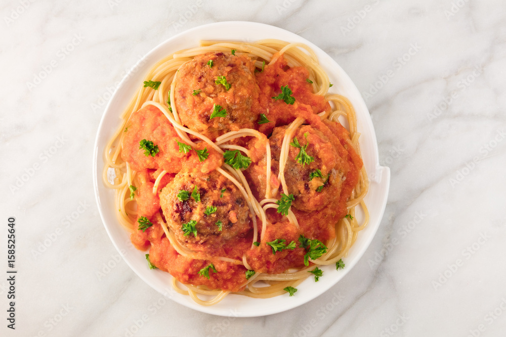 Meatballs and pasta dish, closeup from above with copyspace Meatballs and pasta dish, closeup from above with copyspace