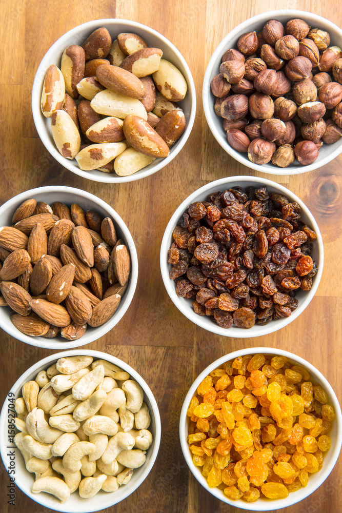 Various nuts and raisins. Various nuts and raisins.