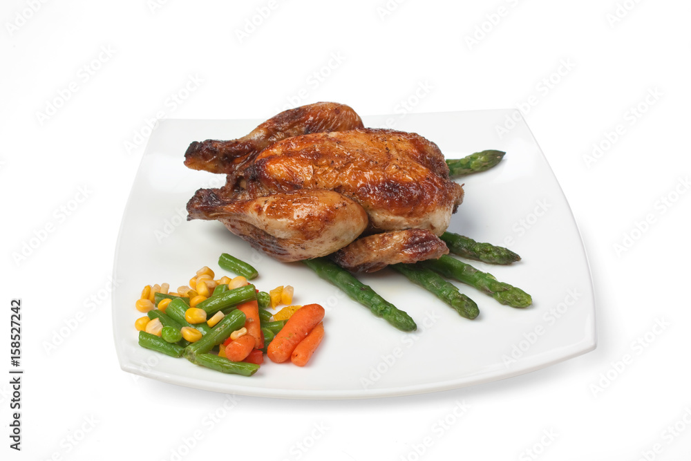dish of fried chicken with vegetables dish of fried chicken with vegetables