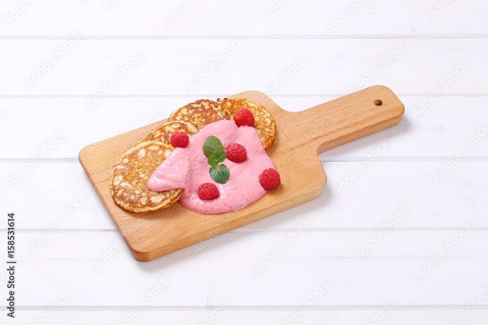 american pancakes with yogurt and raspberries american pancakes with yogurt and raspberries