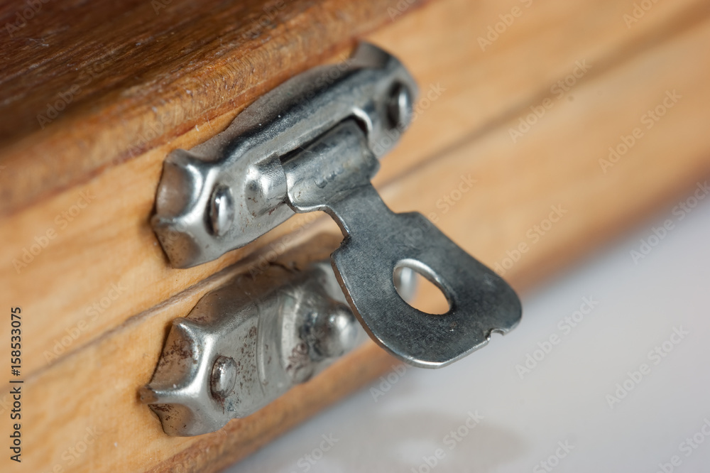 lock on a wooden box lock on a wooden box