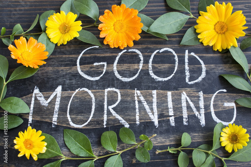 Words Good Morning with Leaves and Marigold Flowers