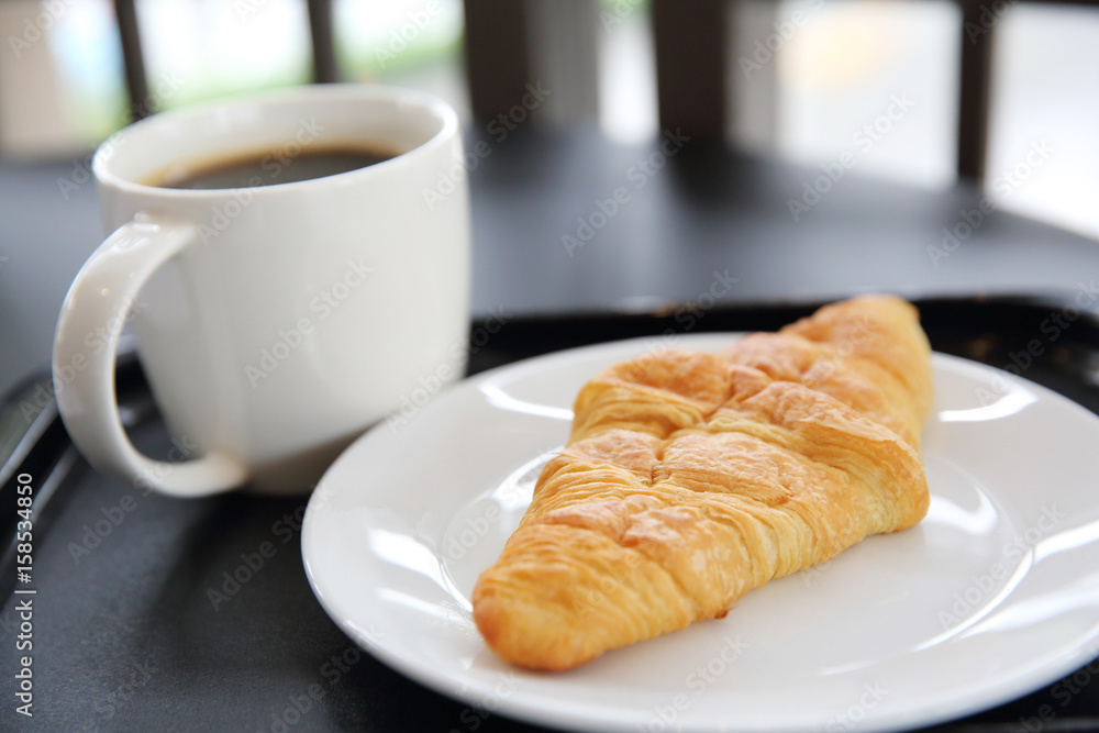 Croissant with coffee