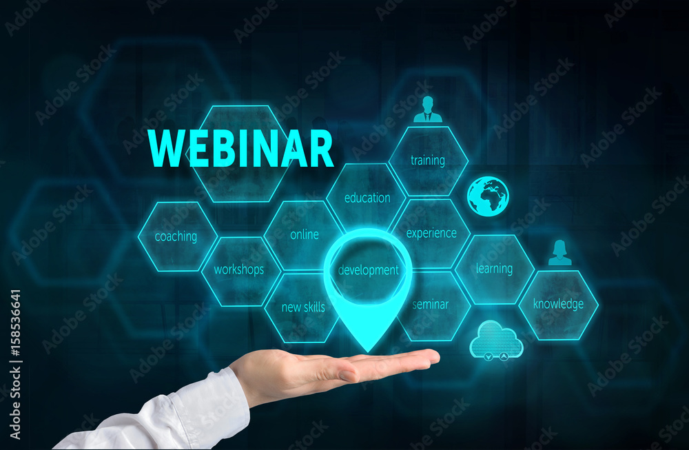 Obraz premium Webinar concept. Presenting gesture of businessman and chart with related keywords and signs over business background. Highlighted development.