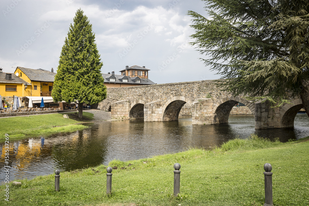 medieval bridge over Meruelo river in Molinaseca village, El Bierzo, Province of León, Spain