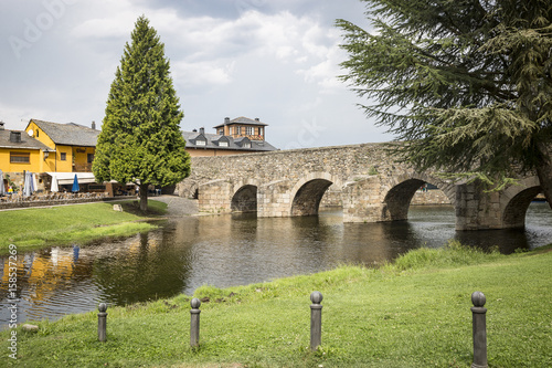 medieval bridge over Meruelo river in Molinaseca village, El Bierzo, Province of León, Spain photo