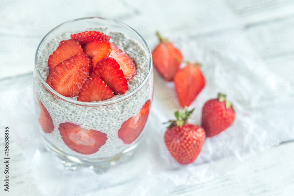 Chia seed puddings with strawberry slices Chia seed puddings with strawberry slices