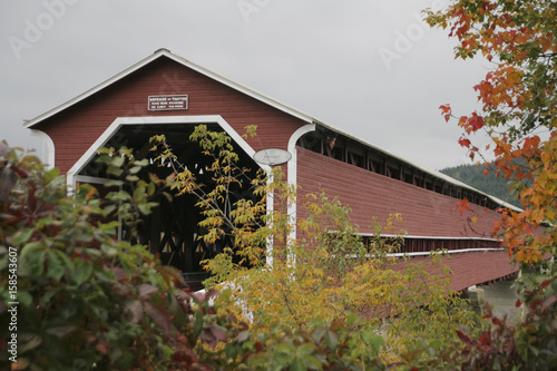 Old red covered bridge located in Beauce, Quebec Canada.