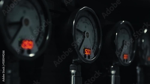 Multiple Gauges Reading Pressure on Equipment