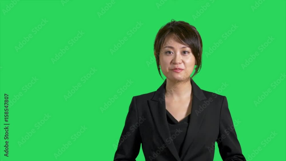 Asian presenter on green screen Asian presenter on green screen