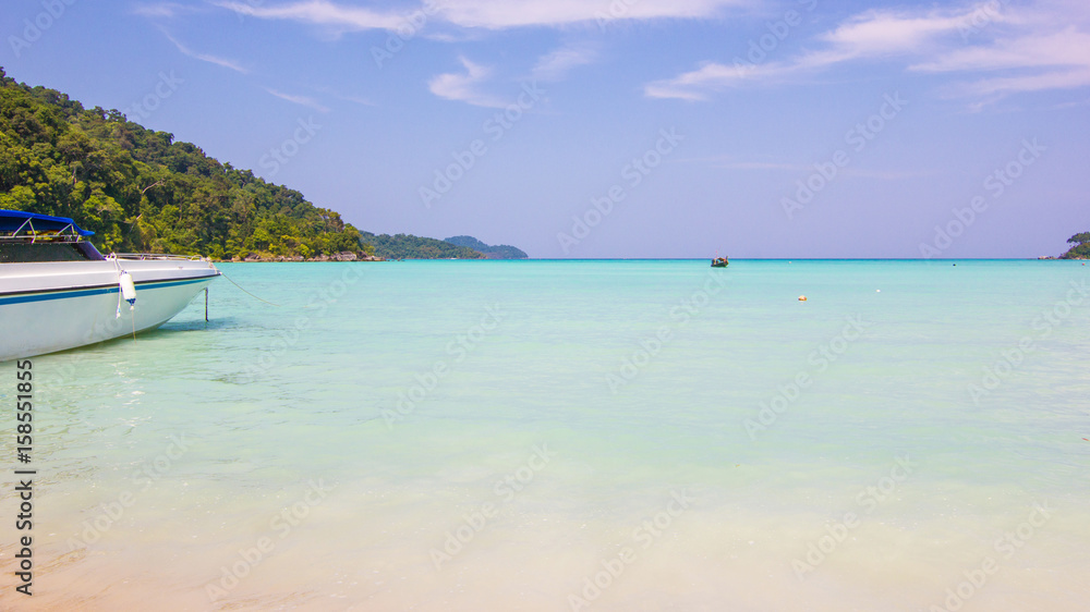 Beautiful landscapes of sky over the sea and tourists on beach in the summer at  in Mu Ko Similan National Park, Phang Nga Province, Thailand