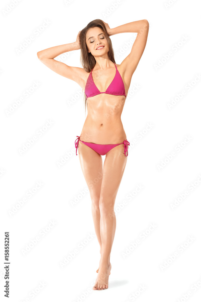 Beautiful young woman in swimsuit on white background Beautiful young woman in swimsuit on white background