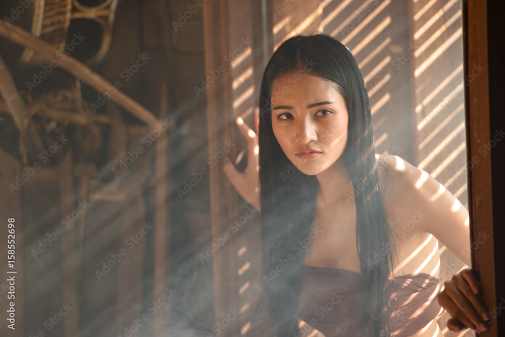 Asian woman wearing traditional thai culture,vintage style,Thailand culture,Thailand traditional