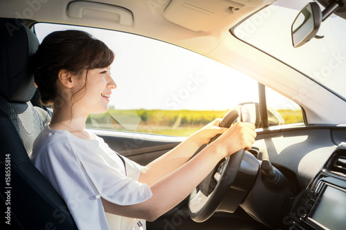 Fotografie, Obraz young woman driving a car.