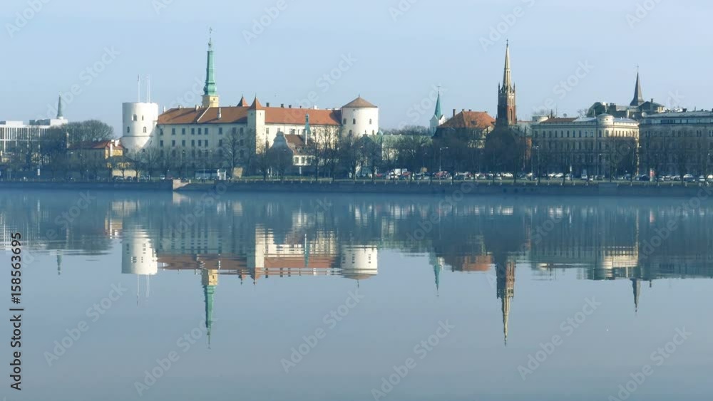 Riga Old Town Skyline seen over foggy river Daugava Riga Old Town Skyline seen over foggy river Daugava
