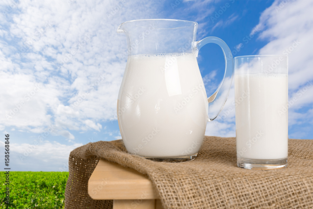 Milk on a table with a natural background Milk on a table with a natural background