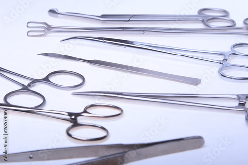 Close Up Surgical instruments and tools on white background. Selective focus.