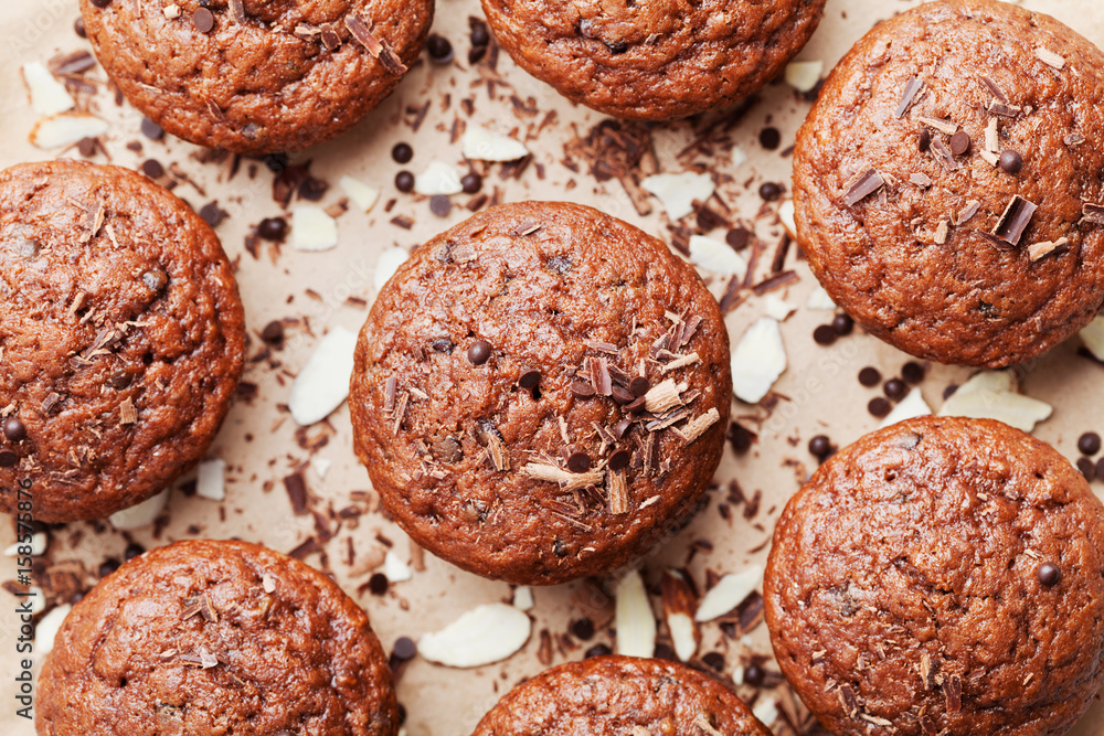 Heap of chocolate muffin on sweet background top view. Heap of chocolate muffin on sweet background top view.