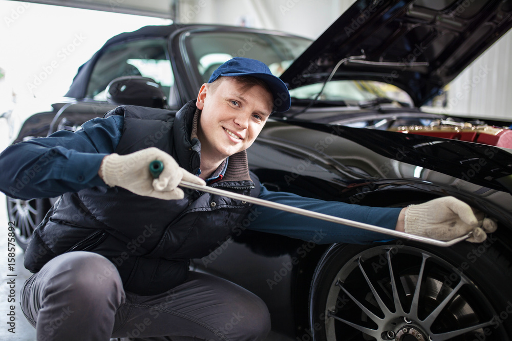 Obraz na plátně Sports car in a workshop