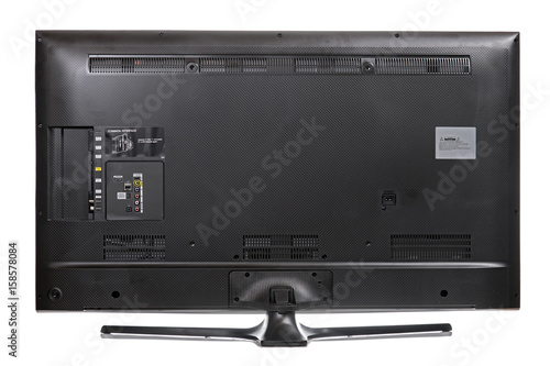 The rear view - backside - with empty connectors. Back of LCD television isolated on a white background.