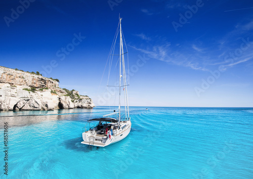 Beautiful bay with sailing boats yacht  Menorca island  Spain. Yachting  travel and active lifestyle concept