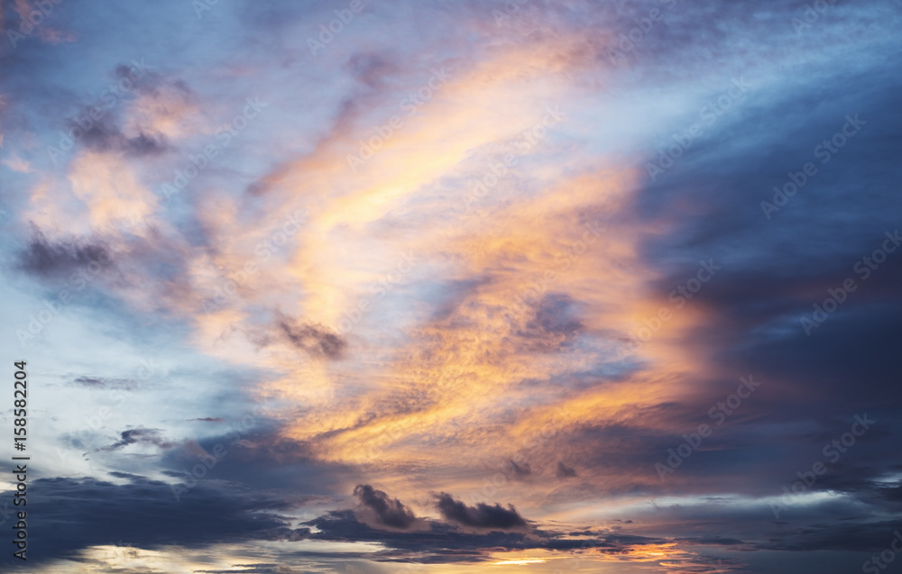 Sky with clouds in sunset background
