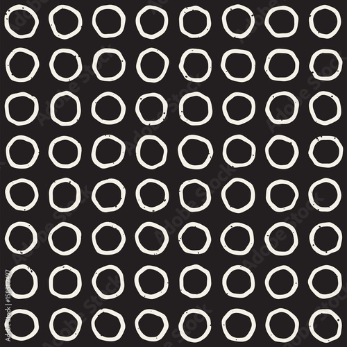 Hand drawn style ethnic seamless pattern. Abstract geometric tiling background in black and white. Vector freehand doodle texture.