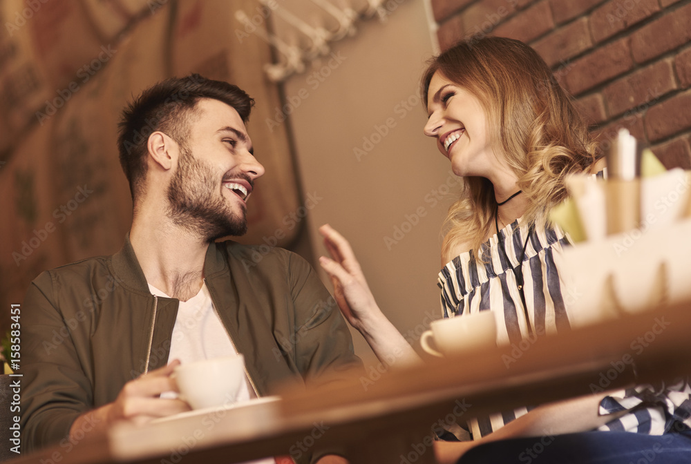 Cheerful couple over romantic date