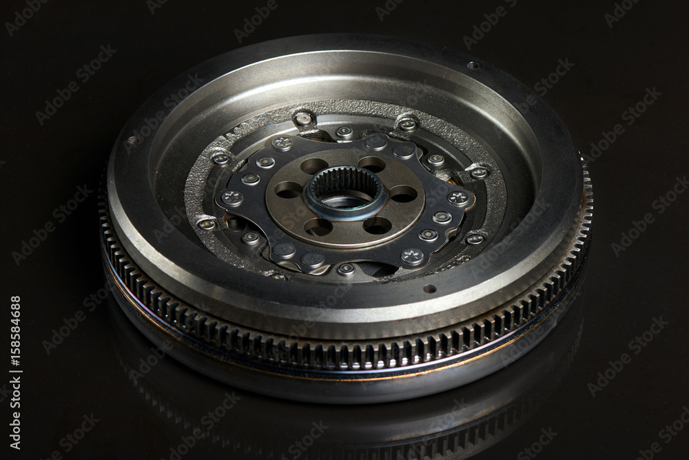 Fotografie Dual-Mass Flywheel front view on black background