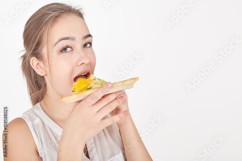 happy woman with pizza on white background with copyspace