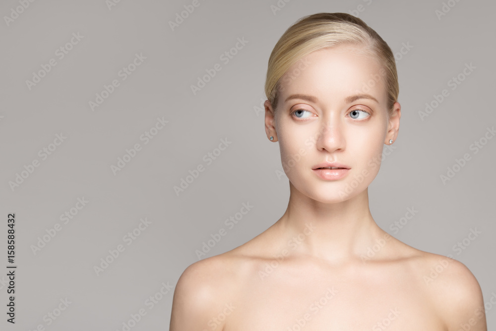 Portrait Of A Beautiful Young Blond Woman With Perfect Skin. Portrait Of A Beautiful Young Blond Woman With Perfect Skin.